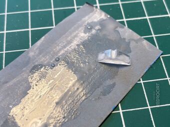 Acrylic glass part on wet sandpaper