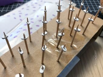 Acrylic parts put on toothpicks